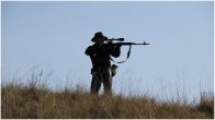 Hunter with a gun
