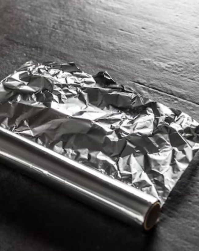 आखिर क्यों लगाते हैं Router पर Aluminium Foil?